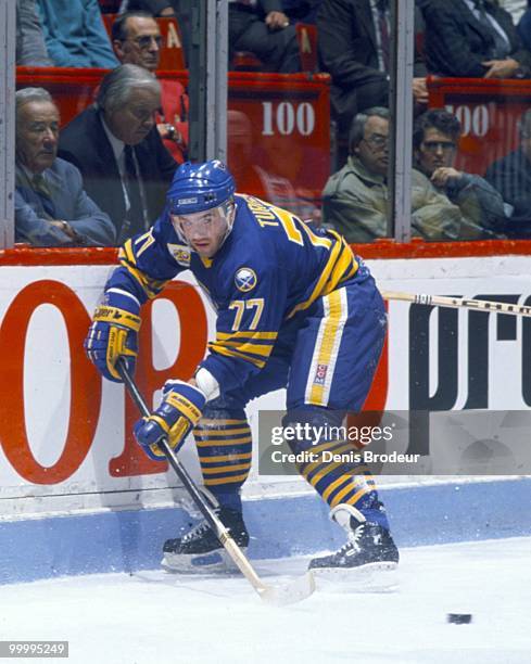 Pierre Turgeon of the Buffalo Sabres skates against the Montreal Canadiens in the early 1990's at the Montreal Forum in Montreal, Quebec, Canada.
