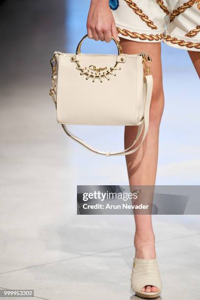 Model, bag detail, walks the runway for Carmen Steffens at Miami Swim Week powered by Art Hearts Fashion Swim/Resort 2018/19 at Faena Forum on July...