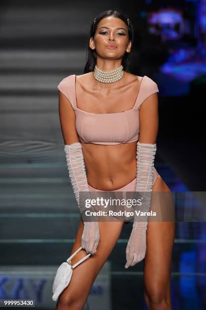 Model walks the runway for Kya Swim during the Paraiso Fasion Fair at The Paraiso Tent on July 15, 2018 in Miami Beach, Florida.