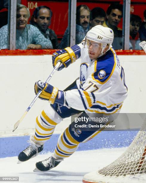 Pierre Turgeon of the Buffalo Sabres skates against the Montreal Canadiens in the early 1990's at the Montreal Forum in Montreal, Quebec, Canada.