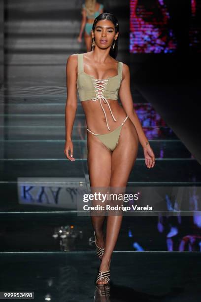 Model walks the runway for Kya Swim during the Paraiso Fasion Fair at The Paraiso Tent on July 15, 2018 in Miami Beach, Florida.