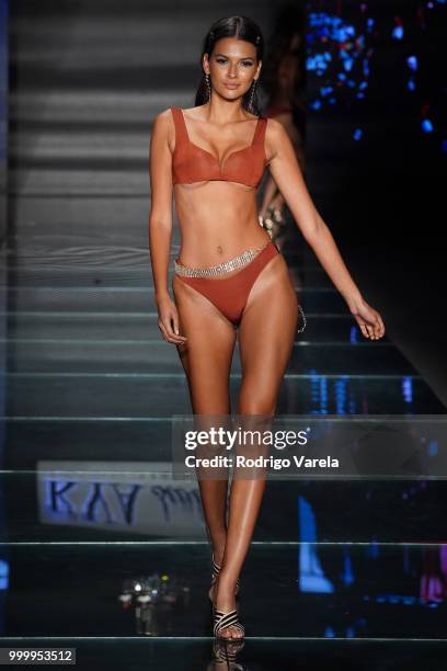 Model walks the runway for Kya Swim during the Paraiso Fasion Fair at The Paraiso Tent on July 15, 2018 in Miami Beach, Florida.