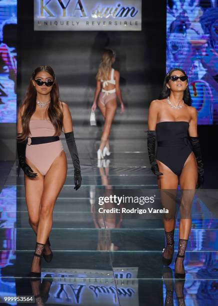 Models walk the runway for Kya Swim during the Paraiso Fasion Fair at The Paraiso Tent on July 15, 2018 in Miami Beach, Florida.