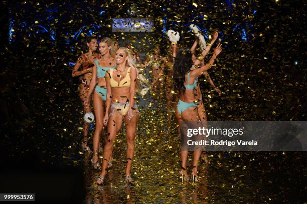 Models walk the runway for Kya Swim during the Paraiso Fasion Fair at The Paraiso Tent on July 15, 2018 in Miami Beach, Florida.