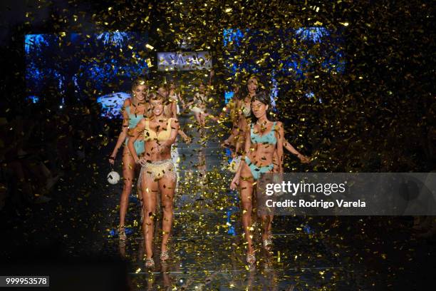 Models walk the runway for Kya Swim during the Paraiso Fasion Fair at The Paraiso Tent on July 15, 2018 in Miami Beach, Florida.