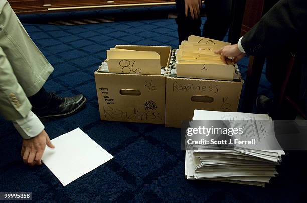 May 19: Committee aides sort amendments during the House Armed Services markup of the fiscal 2011 defense authorization bill.