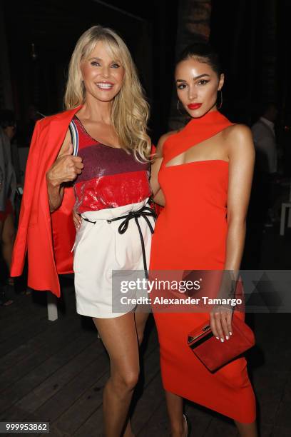 Christie Brinkley and Olivia Culpo attend the 2018 Sports Illustrated Swimsuit show at PARAISO during Miami Swim Week at The W Hotel South Beach on...