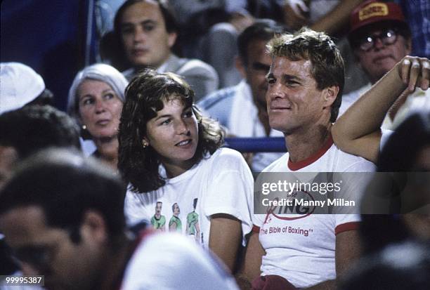 Celebrity actor Tatum O'Neal watching boyfriend John McEnroe with her father Ryan O'Neal during match at National Tennis Center. Flushing, NY...