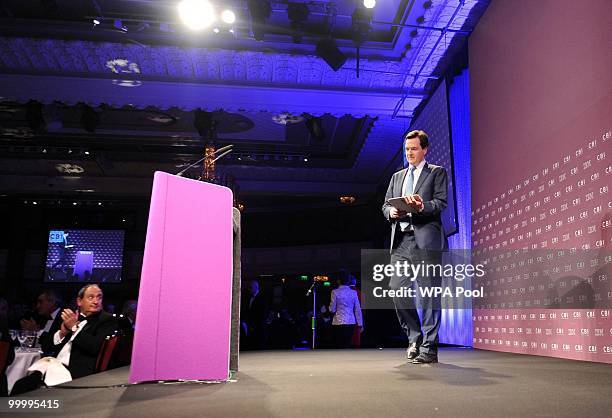 Chancellor of the Exchequer George Osborne prepares to deliver a speech at the British Industry's annual dinner at the Grosvenor House Hotel on May...