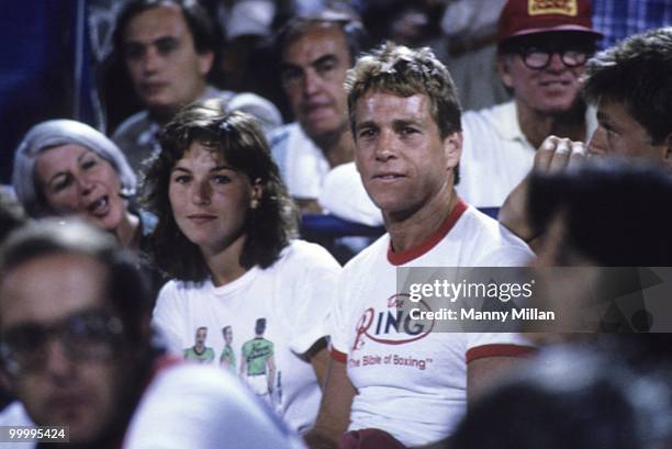 Celebrity actor Tatum O'Neal watching boyfriend John McEnroe with her father Ryan O'Neal during match at National Tennis Center. Flushing, NY...