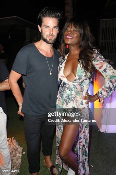 Davide Edoardo Sola and Tayo Otiti attend the 2018 Sports Illustrated Swimsuit party at PARAISO during Miami Swim Week at The W Hotel South Beach on...