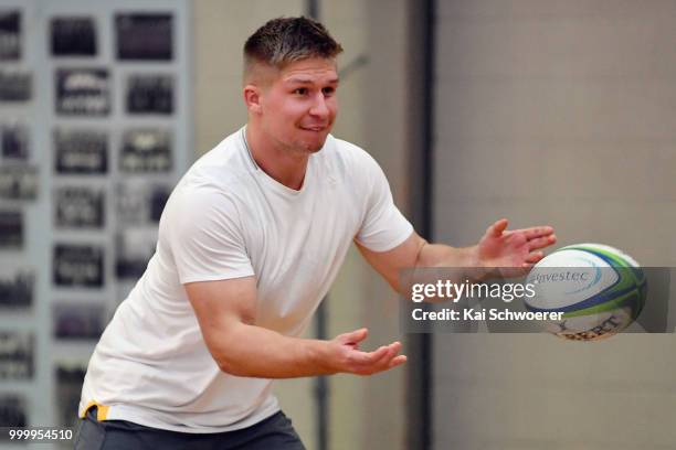 Jack Goodhue passes the ball during a Crusaders Super Rugby training session at St Andrew's College on July 16, 2018 in Christchurch, New Zealand.