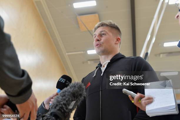 Jack Goodhue speaks to the media following a Crusaders Super Rugby training session at St Andrew's College on July 16, 2018 in Christchurch, New...