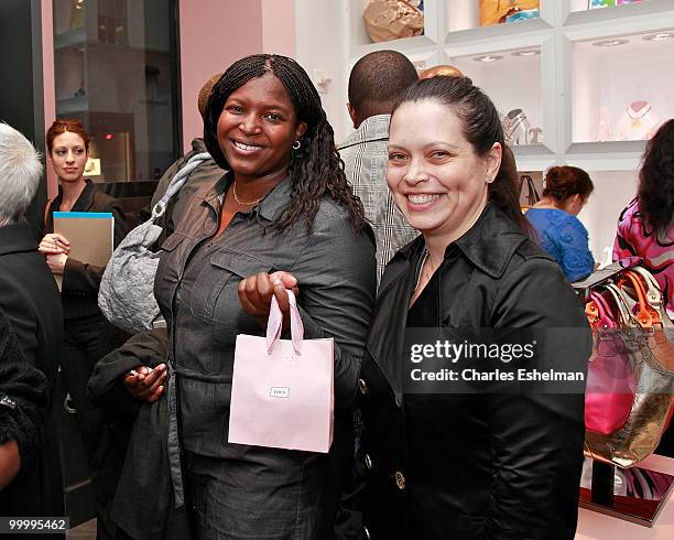 Promotion Director Candi Shand and Darlene Rosado attends the in store celebration of the new Tous Boutique hosted by Gotham Magazine at Tous...