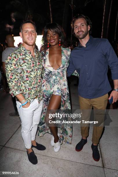 Ric Sarille, Tayo Otiti and Conner Vernon attend the 2018 Sports Illustrated Swimsuit party at PARAISO during Miami Swim Week at The W Hotel South...