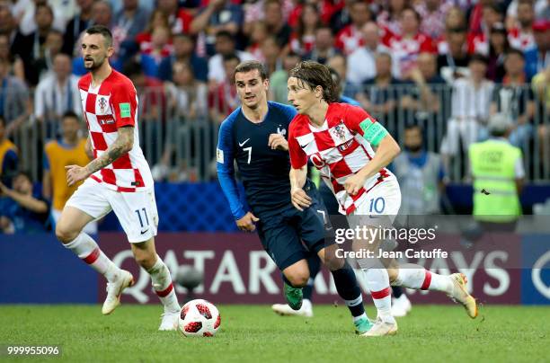 Luka Modric of Croatia, Antoine Griezmann of France during the 2018 FIFA World Cup Russia Final between France and Croatia at Luzhniki Stadium on...