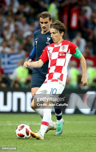 Luka Modric of Croatia, Antoine Griezmann of France during the 2018 FIFA World Cup Russia Final between France and Croatia at Luzhniki Stadium on...