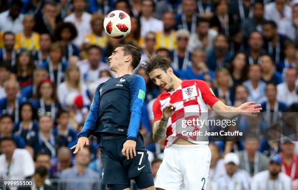 Antoine Griezmann of France, Sime Vrsaljko of Croatia during the 2018 FIFA World Cup Russia Final between France and Croatia at Luzhniki Stadium on...
