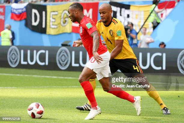 Raheem Sterling of England, Vincent Kompany of Belgium during the 2018 FIFA World Cup Russia 3rd Place Playoff match between Belgium and England at...