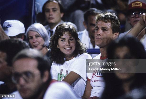 Celebrity actor Tatum O'Neal watching boyfriend John McEnroe with her father Ryan O'Neal during match at National Tennis Center. Flushing, NY...