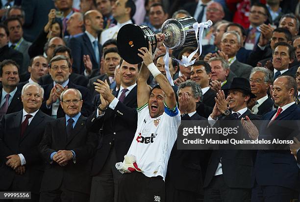 Andres Palop of Sevilla holds up the trophy after the Copa del Rey final between Atletico de Madrid and Sevilla at Camp Nou stadium on May 19, 2010...