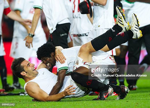 Alvaro Negredo of Sevilla celebrates with his teammate Zokora after the Copa del Rey final between Atletico de Madrid and Sevilla at Camp Nou stadium...