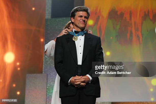 Dr. Timothy Shriver is honored on stage at the 2018 So the World May Hear Awards Gala benefitting Starkey Hearing Foundation at the Saint Paul...