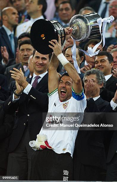 Andres Palop of Sevilla holds up the trophy after the Copa del Rey final between Atletico de Madrid and Sevilla at Camp Nou stadium on May 19, 2010...