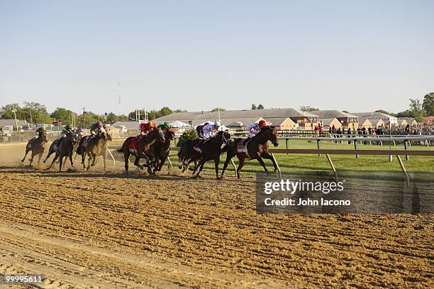 Preakness Stakes: Martin Garcia in action aboard Lookin At Lucky vs Paul Atkinson aboard Caracortado , Calvin Borel aboard Super Saver , and Ramon...