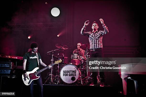 Greg Churchouse, Pete Ellard and Roy Stride of Scouting For Girls perform on stage at Hammersmith Apollo on May 19, 2010 in London, England.