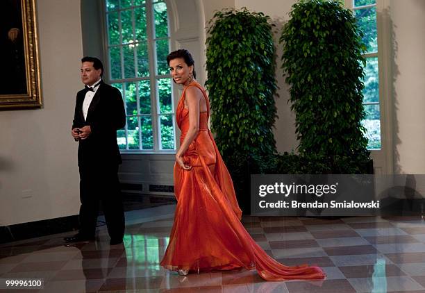 Eva Longoria-Parker and David Figueroa arrive at the White House for a state dinner May 19, 2010 in Washington, DC. President Barack Obama and first...