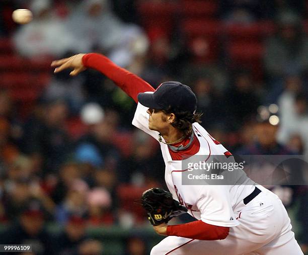 Clay Buchholz of the Boston Red Sox delivers a pitch in the first inning against the Minnesota Twins on May 19, 2010 at Fenway Park in Boston,...