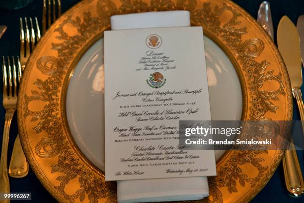 View of a place setting in the East Room of the White House before a state dinner May 19, 2010 in Washington, DC. President Barack Obama and first...