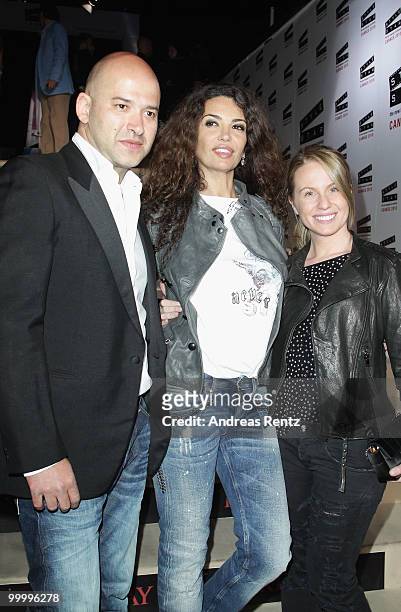 Replay's CEO Matteo Sinigaglia, Afef Jnifen and guest arrive at the Replay Party during the 63rd Annual Cannes Film Festival at Style Star Lounge on...
