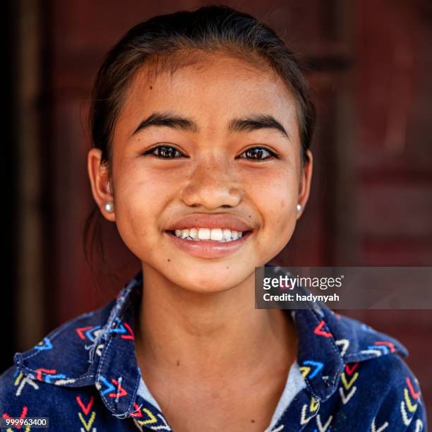 laotian little girl in a village in northern laos - laotian culture stock pictures, royalty-free photos & images