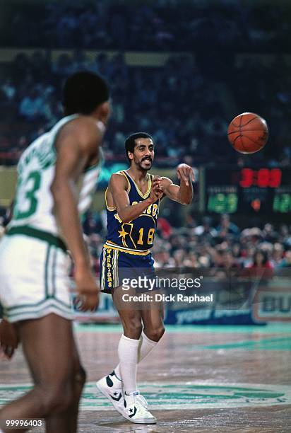 Lorenzo Romar of the Golden State Warriors passes against the Boston Celtics during a game played in 1983 at the Boston Garden in Boston,...