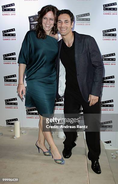 Actor Raul Bova and wife Chiara Giordano arrive at the Replay Party during the 63rd Annual Cannes Film Festival at Style Star Lounge on May 19, 2010...