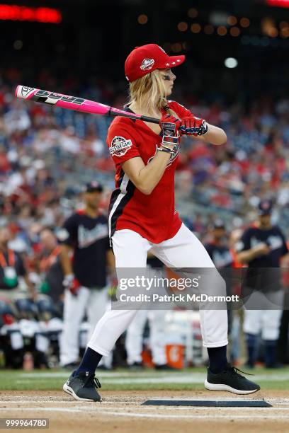 Ashley Greene bats during the All-Star and Legends Celebrity Softball Game at Nationals Park on July 15, 2018 in Washington, DC.