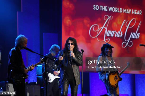 Robby Krieger, Alice Cooper, Don Felder and Ryan Roxie perform at the 2018 So the World May Hear Awards Gala benefitting Starkey Hearing Foundation...