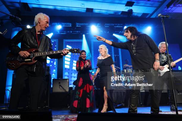 Robby Krieger, Co-Founder of Starkey Hearing Foundation Tani Austin, an attendee, Alice Cooper and Don Felder perform at the 2018 So the World May...
