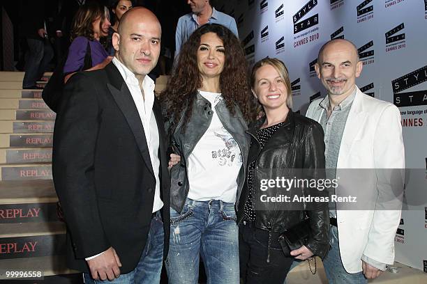 Replay's CEO Matteo Sinigaglia, Afef Jnifen and guests arrive at the Replay Party during the 63rd Annual Cannes Film Festival at Style Star Lounge on...