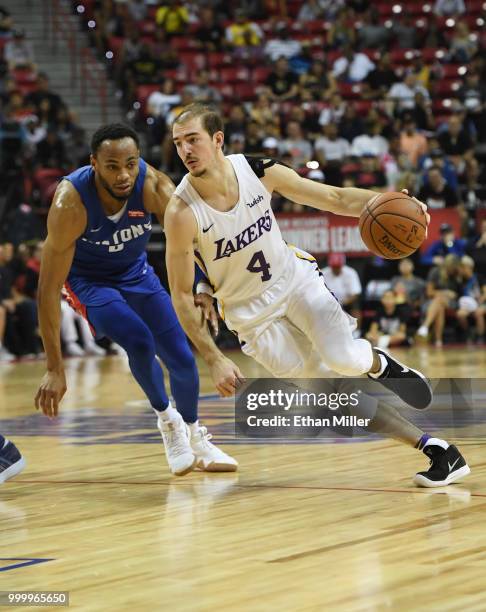 Alex Caruso of the Los Angeles Lakers drives against Bruce Brown of the Detroit Pistons during a quarterfinal game of the 2018 NBA Summer League at...