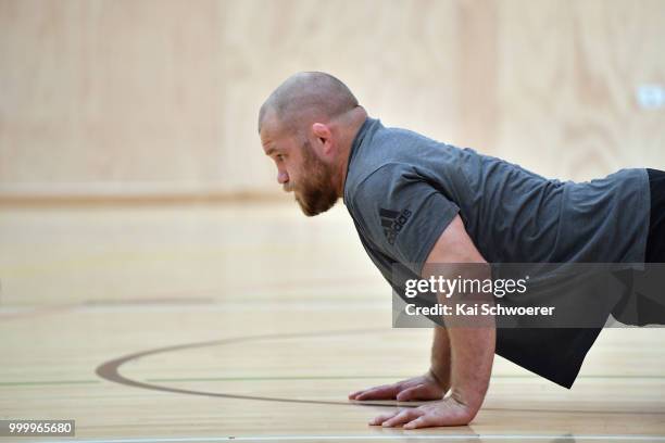 Owen Franks stretches during a Crusaders Super Rugby training session at St Andrew's College on July 16, 2018 in Christchurch, New Zealand.