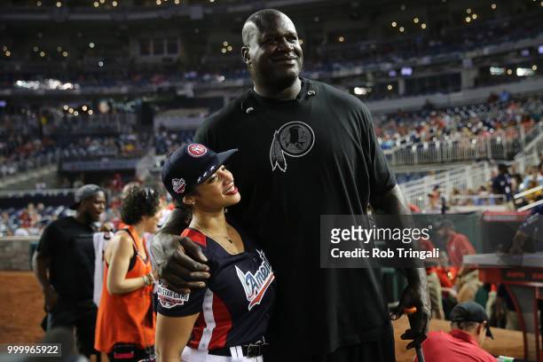 Actress Dascha Polanco and Shaquille O'Neal pose during the Legends & Celebrity Softball Game at Nationals Park on Sunday, July 15, 2018 in...