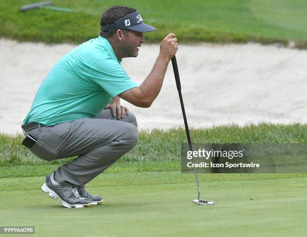 Jason Bohn lines up his ;putt on the green during the final round of the John Deere Classic on July 15 at TPC Deere Run, Silvis, IL.