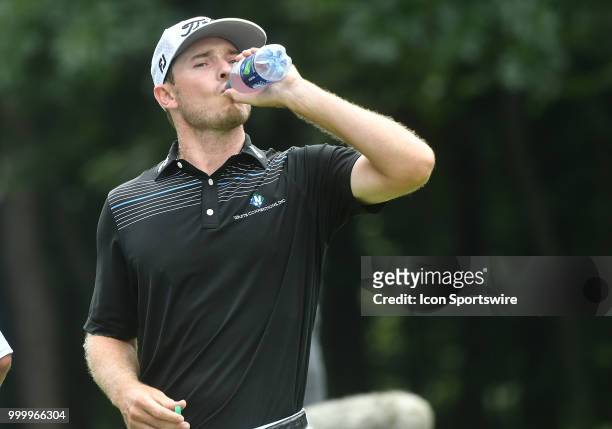 Bronson Burgoon drinks some water during a break on the hole during the final round of the John Deere Classic on July 15 at TPC Deere Run, Silvis, IL.