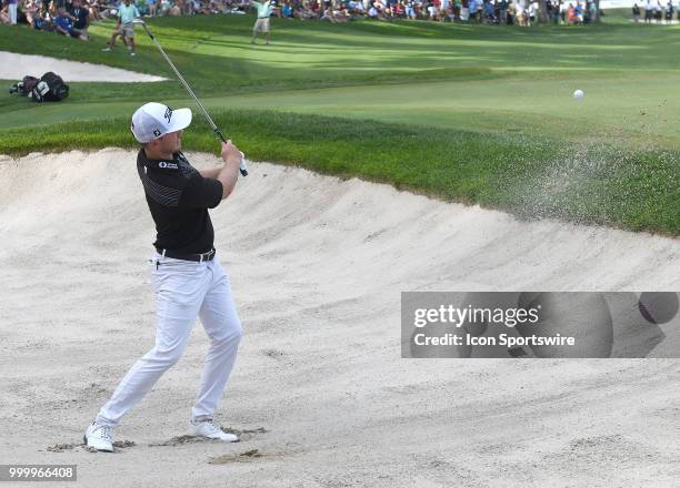 Bronson Burgoon hits out of the sand trap on the green during the final round of the John Deere Classic on July 15 at TPC Deere Run, Silvis, IL.