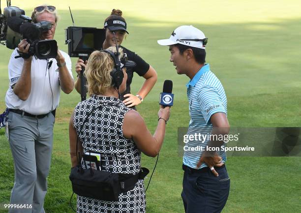 Michael Kim is interviewed by CBS Sports after winning the John Deere Classic on July 15 at TPC Deere Run, Silvis, IL.