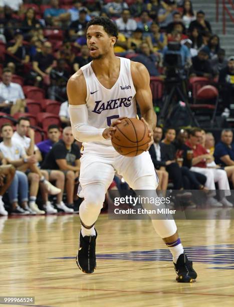 Josh Hart of the Los Angeles Lakers handles the ball against the Detroit Pistons during a quarterfinal game of the 2018 NBA Summer League at the...