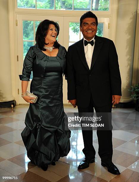 Comedian George Lopez with his wife Ann arrive for the State Dinner in honor of the visiting Mexican President Felipe Calderon on May 19, 2010 at the...